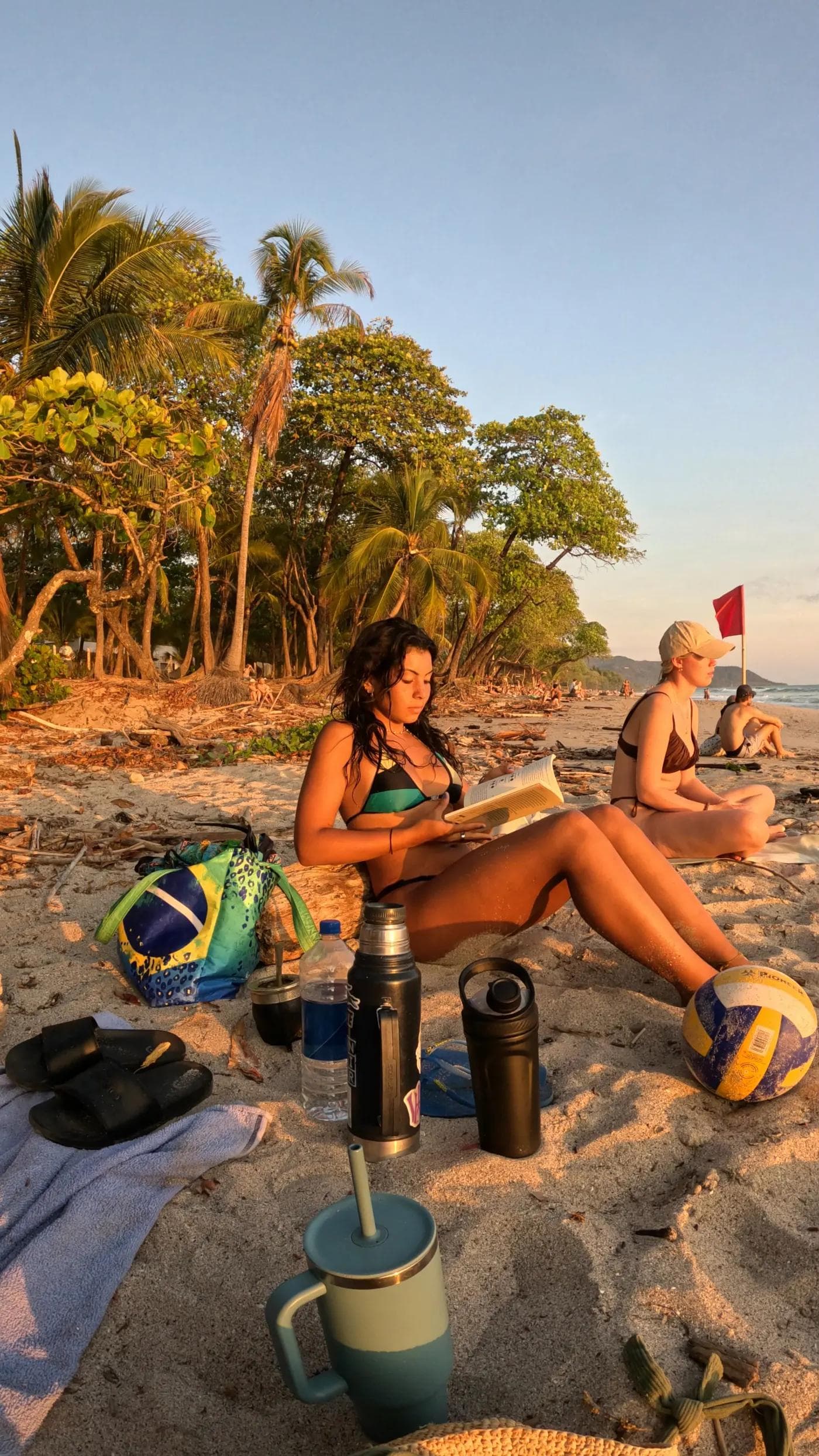 Reading on the beach at golden hour